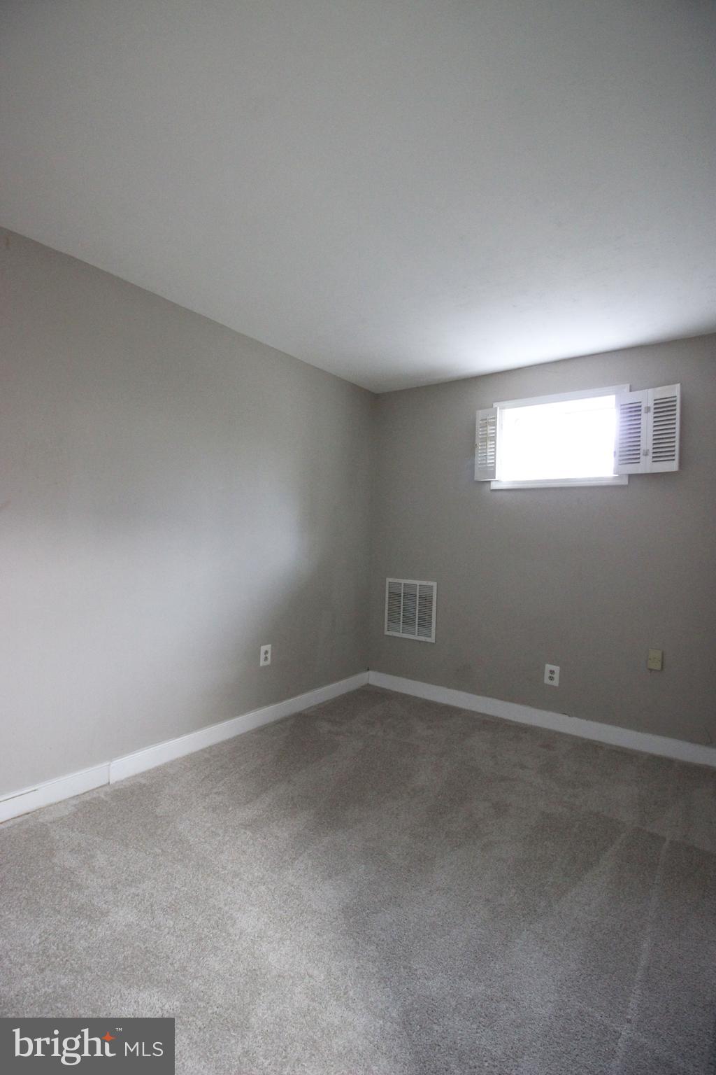 8022 Northumberland Road Springfield, VA 22153 - Photo 18 of 42 a view of an empty room and window
