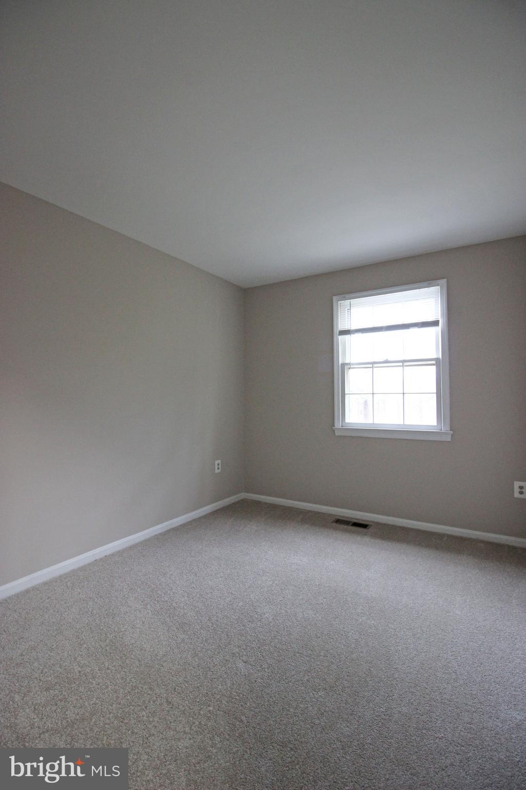 8022 Northumberland Road Springfield, VA 22153 - Photo 20 of 42 an empty room with a window