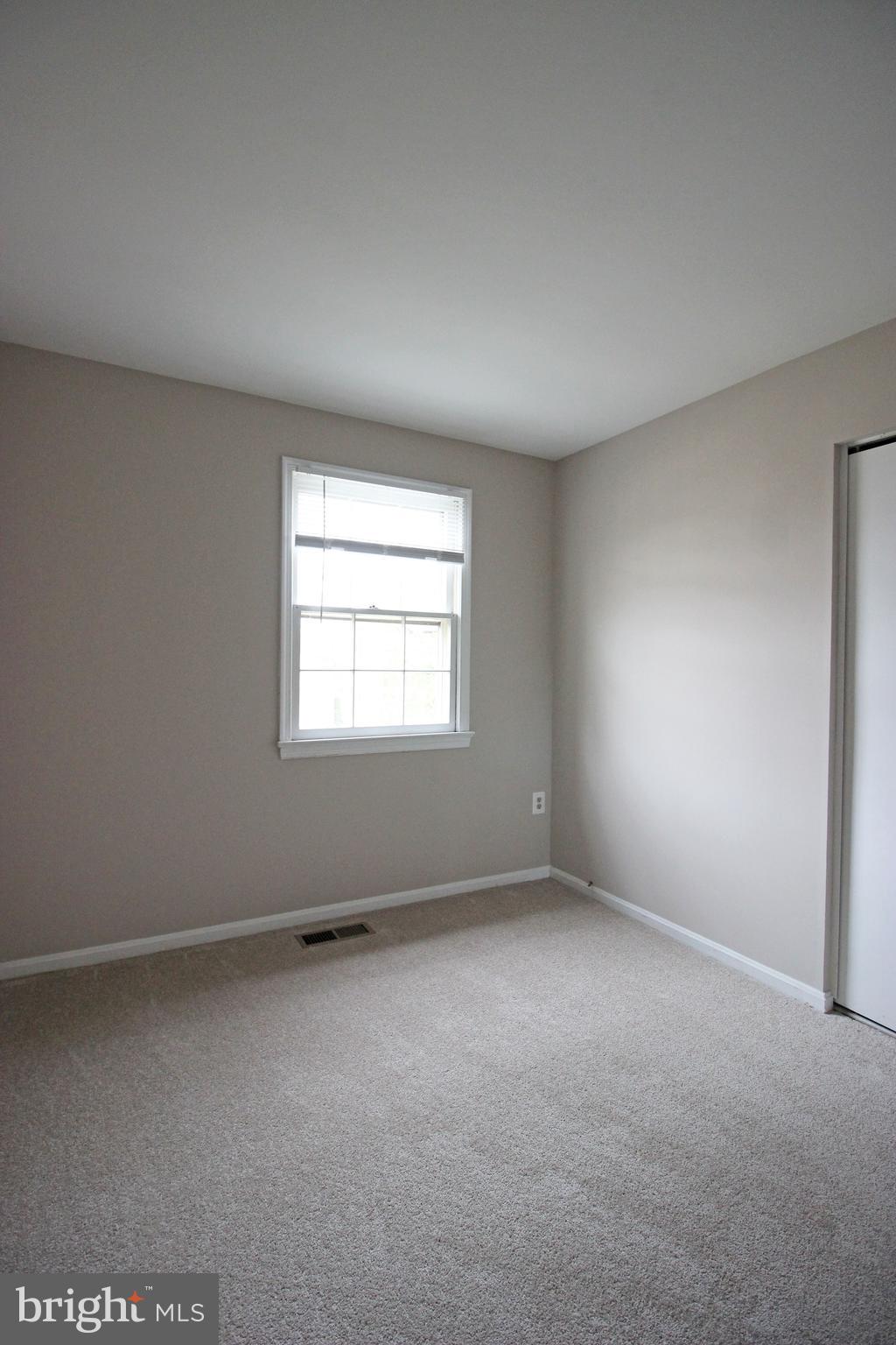 8022 Northumberland Road Springfield, VA 22153 - Photo 21 of 42 an empty room with a window