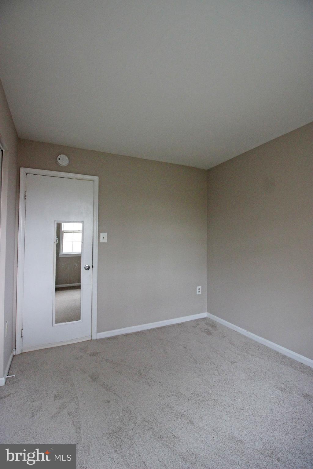 8022 Northumberland Road Springfield, VA 22153 - Photo 23 of 42 a view of an empty room and window