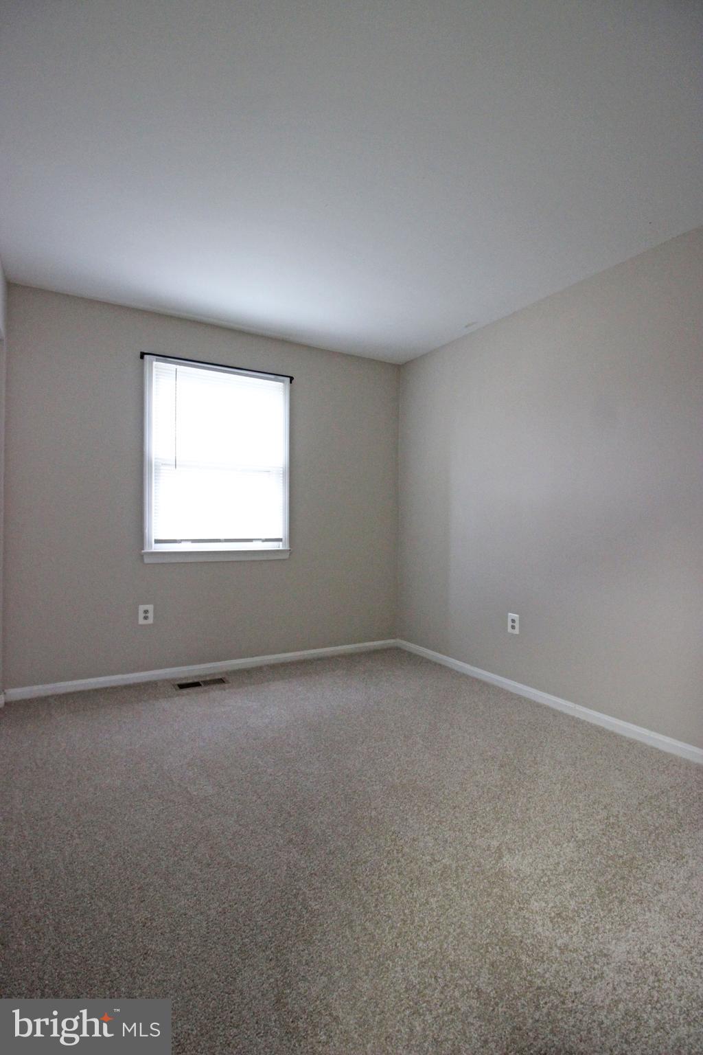 8022 Northumberland Road Springfield, VA 22153 - Photo 24 of 42 an empty room with a window