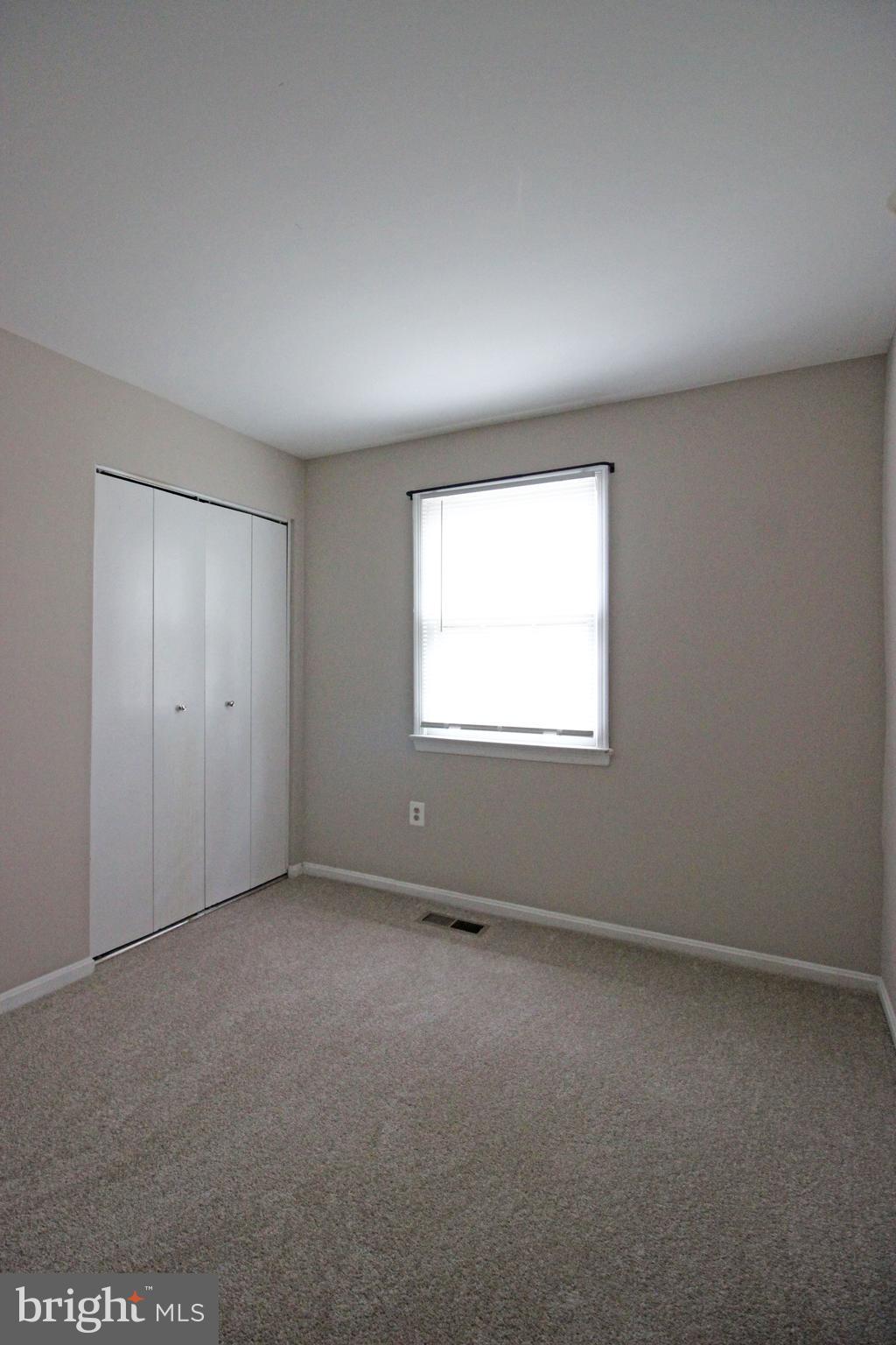8022 Northumberland Road Springfield, VA 22153 - Photo 25 of 42 an empty room with a window