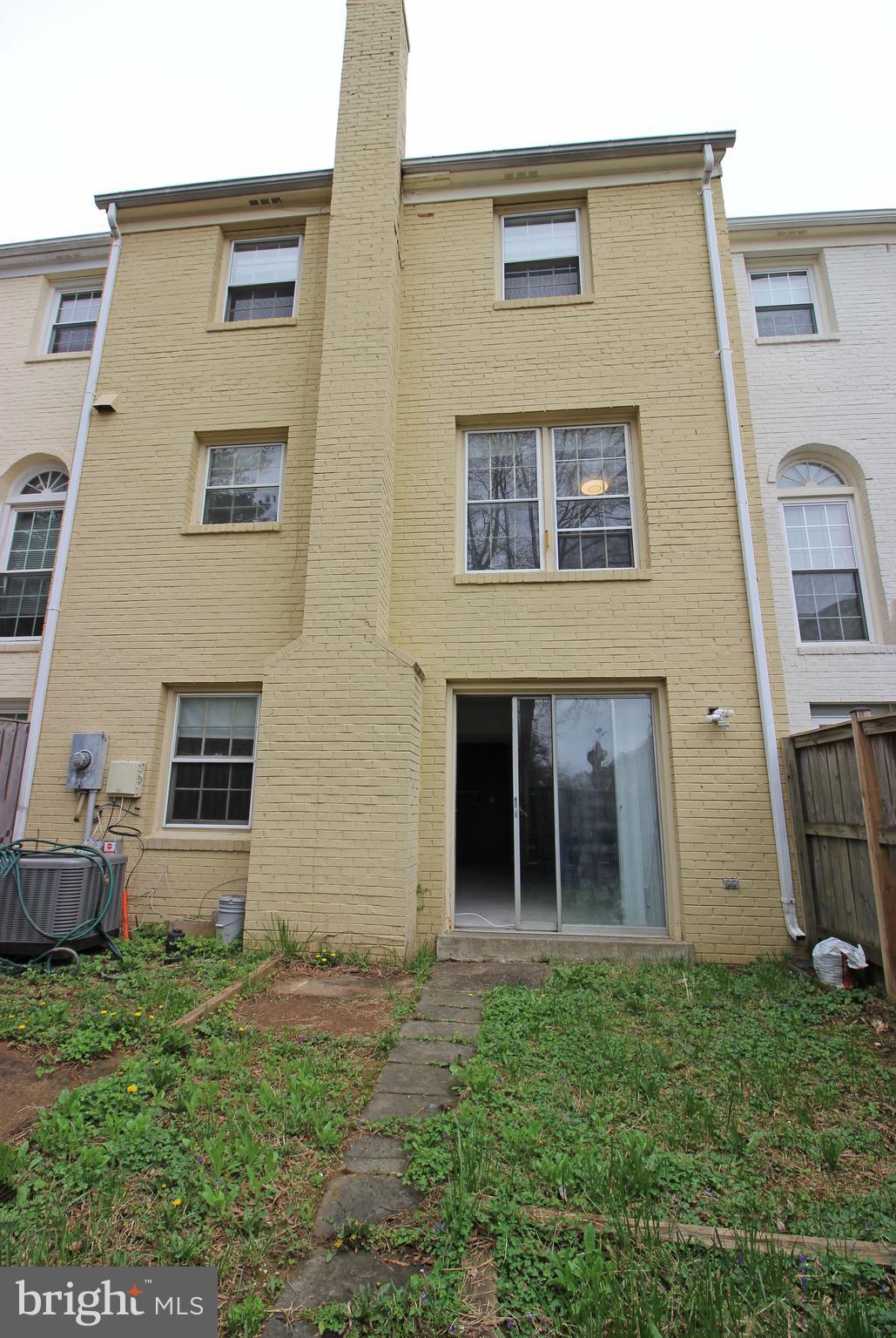 8022 Northumberland Road Springfield, VA 22153 - Photo 34 of 42 front view of a house with a yard