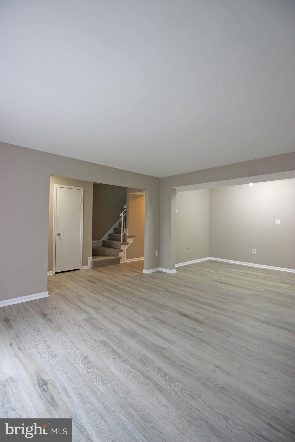 8022 Northumberland Road Springfield, VA 22153 - Photo 4 of 42 a view of empty room with wooden floor