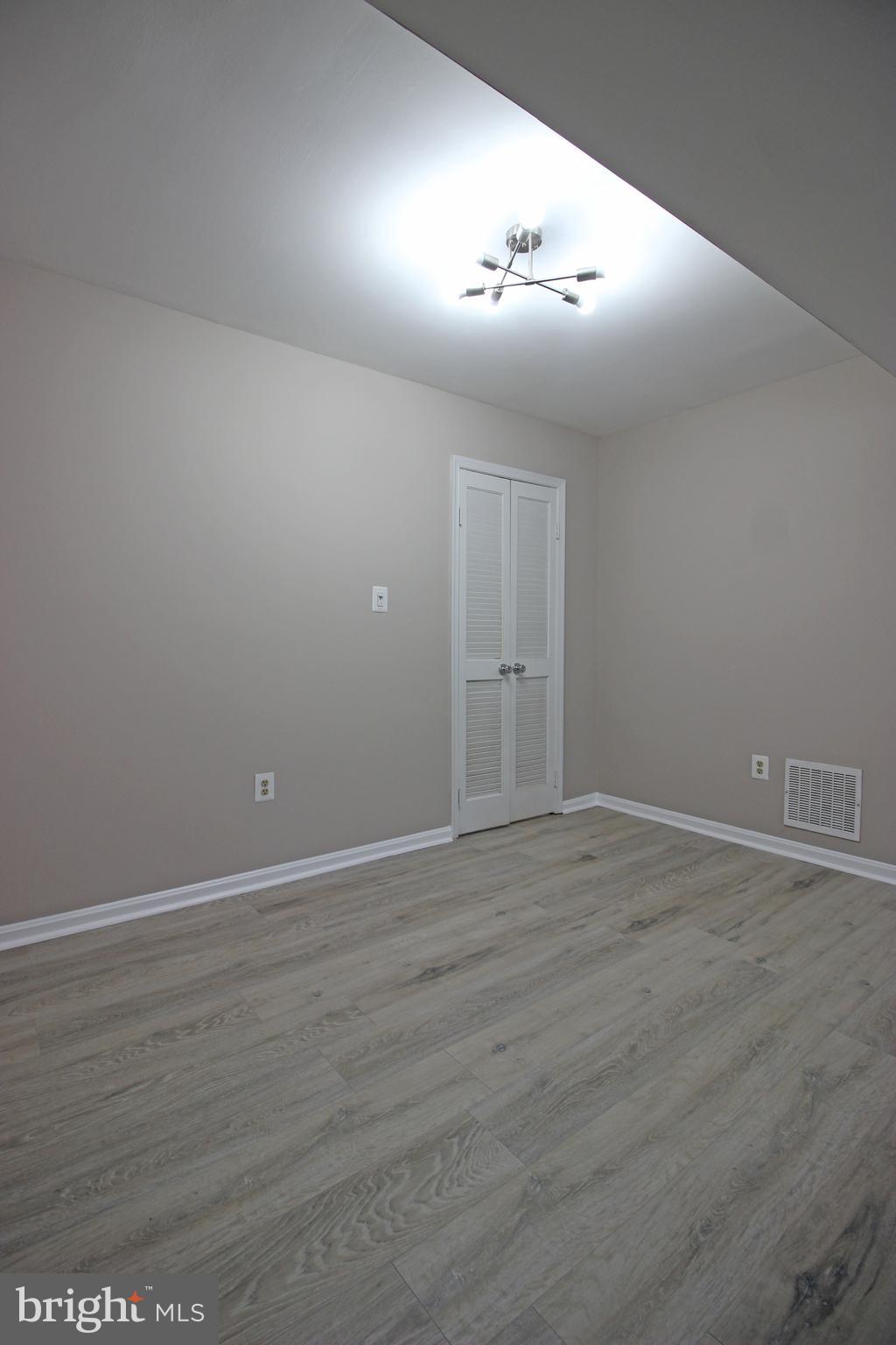8022 Northumberland Road Springfield, VA 22153 - Photo 7 of 42 wooden floor in an empty room