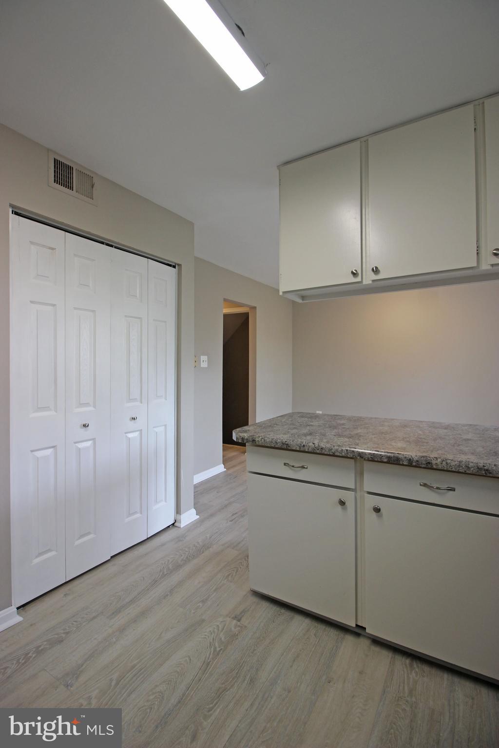 8022 Northumberland Road Springfield, VA 22153 - Photo 10 of 42 an empty room with wooden floor
