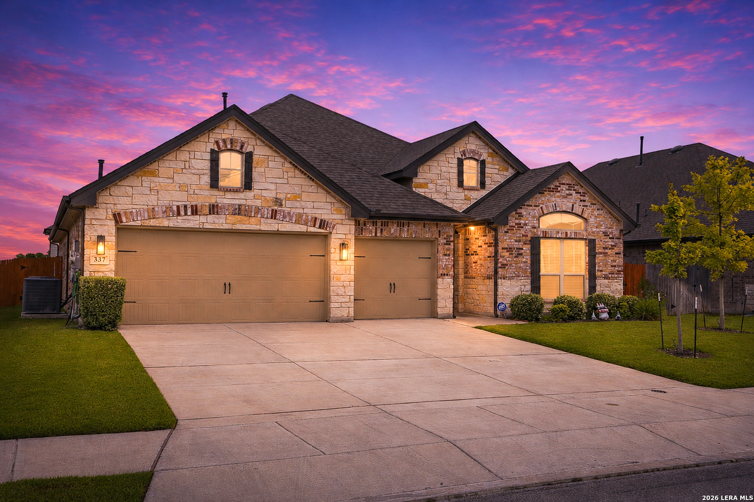 337 Misty Sails Cibolo, TX 78108 - Photo 3 of 50 a front view of a house with garden