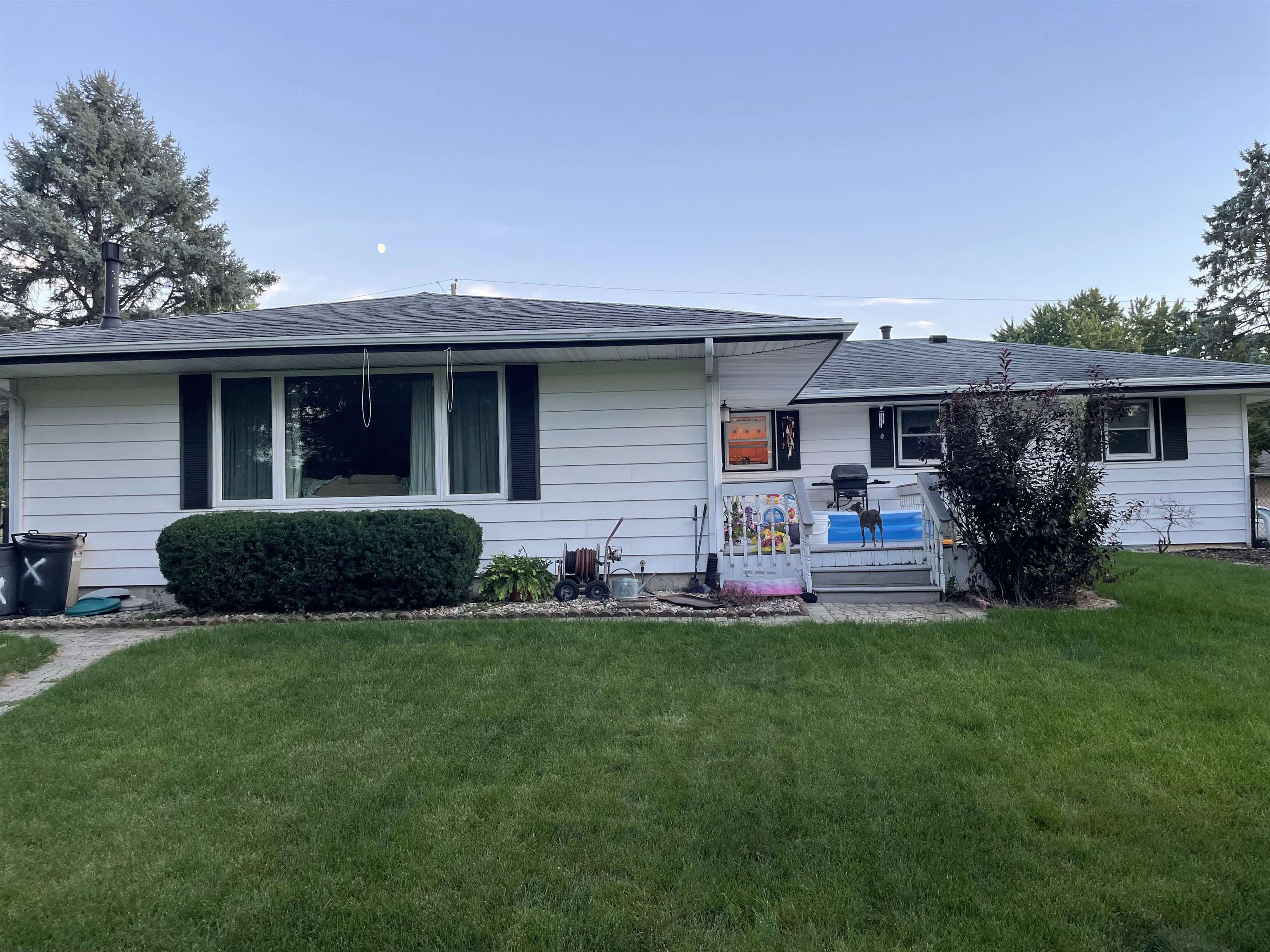 232 East 10th Street Pecatonica, IL 61063 - Photo 9 of 15 a front view of house with yard and outdoor seating