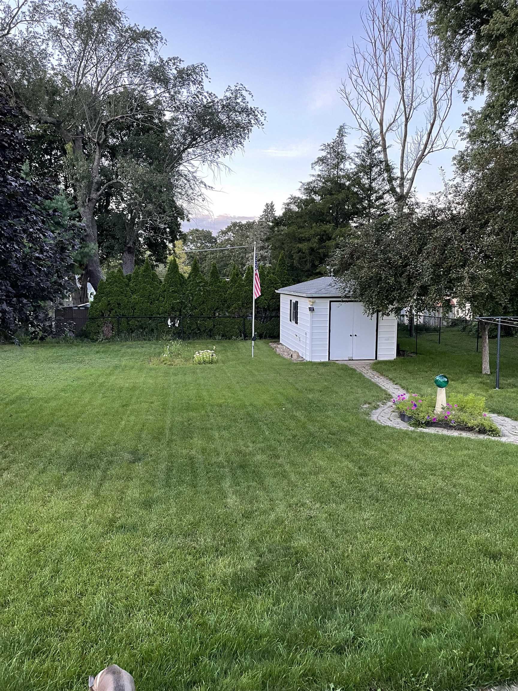232 East 10th Street Pecatonica, IL 61063 - Photo 10 of 15 a view of a house with a yard