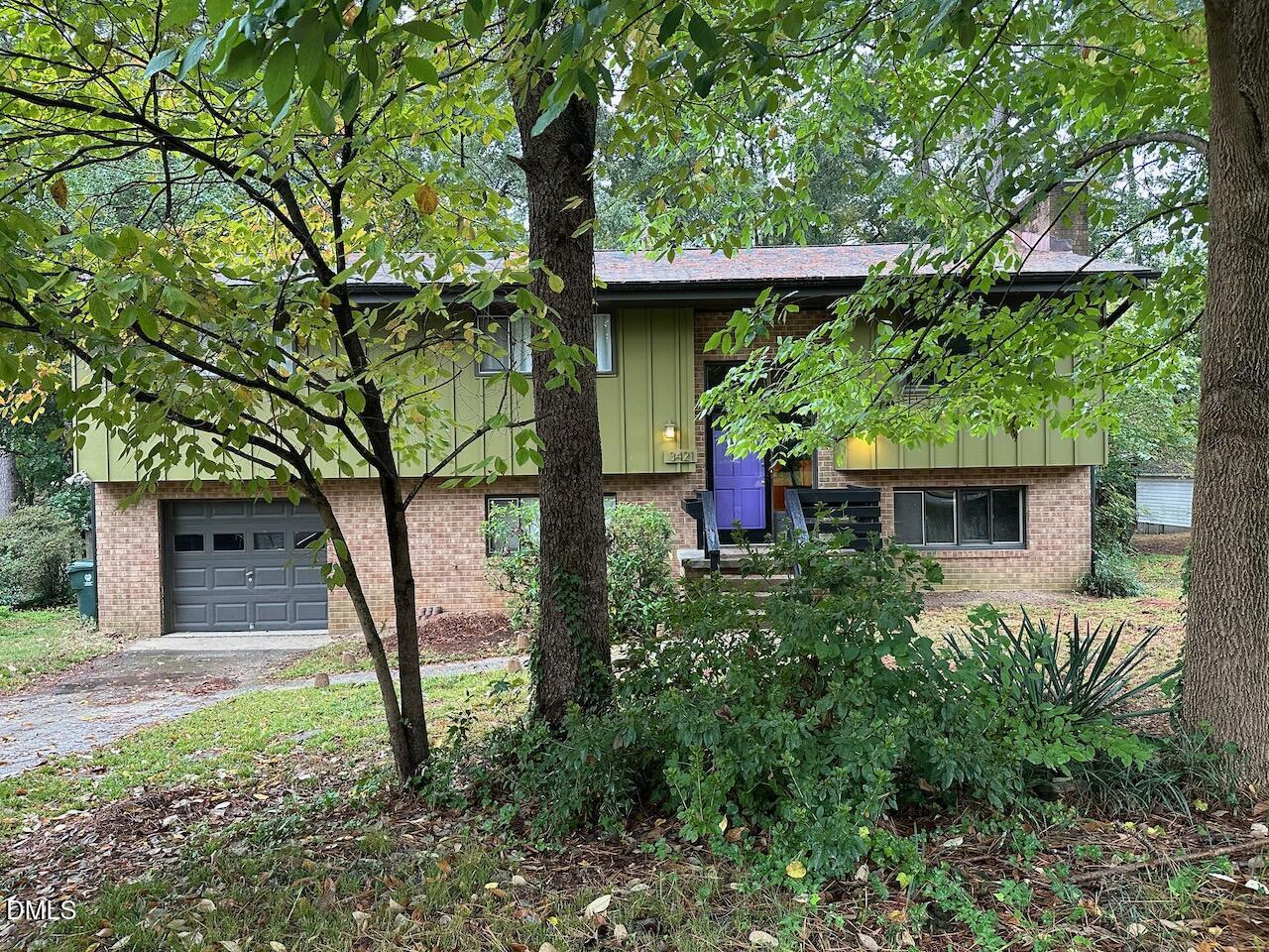3421 Huntleigh Drive Raleigh, NC 27604 - Photo 2 of 27 a front view of a house with garden