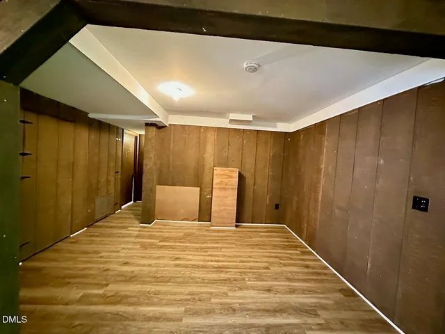 a view of balcony with wooden floor