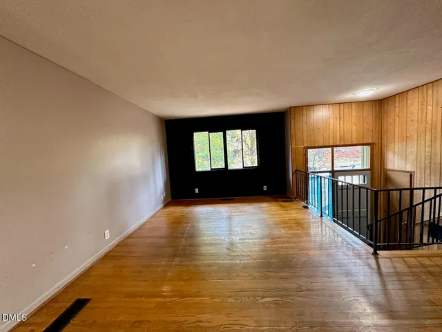 a view of entryway with a window and stairs