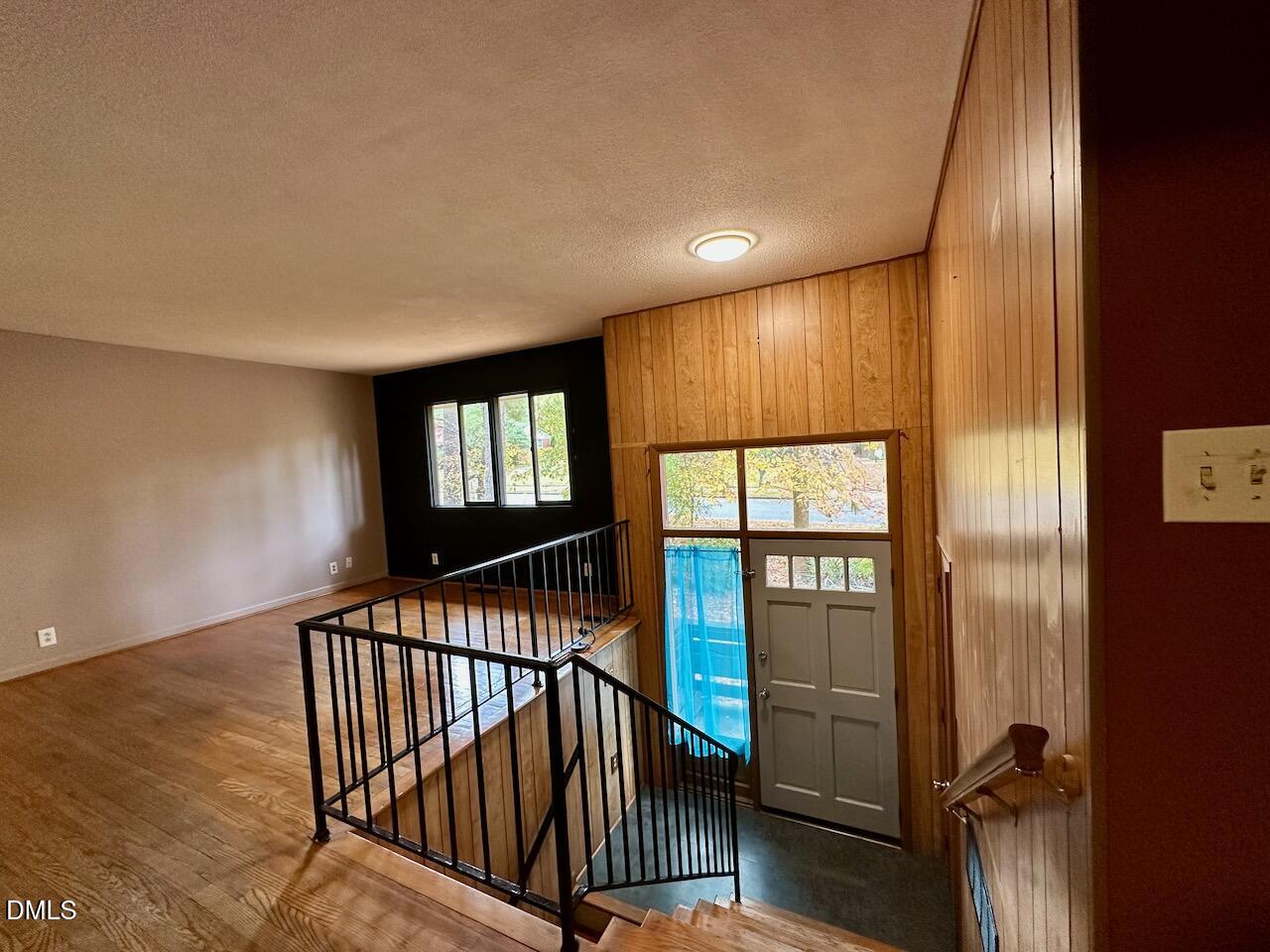 3421 Huntleigh Drive Raleigh, NC 27604 - Photo 6 of 27 a view of entryway with a window and stairs