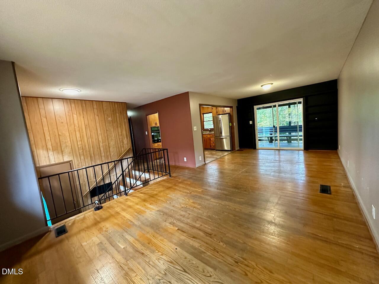3421 Huntleigh Drive Raleigh, NC 27604 - Photo 7 of 27 wooden floor with a window