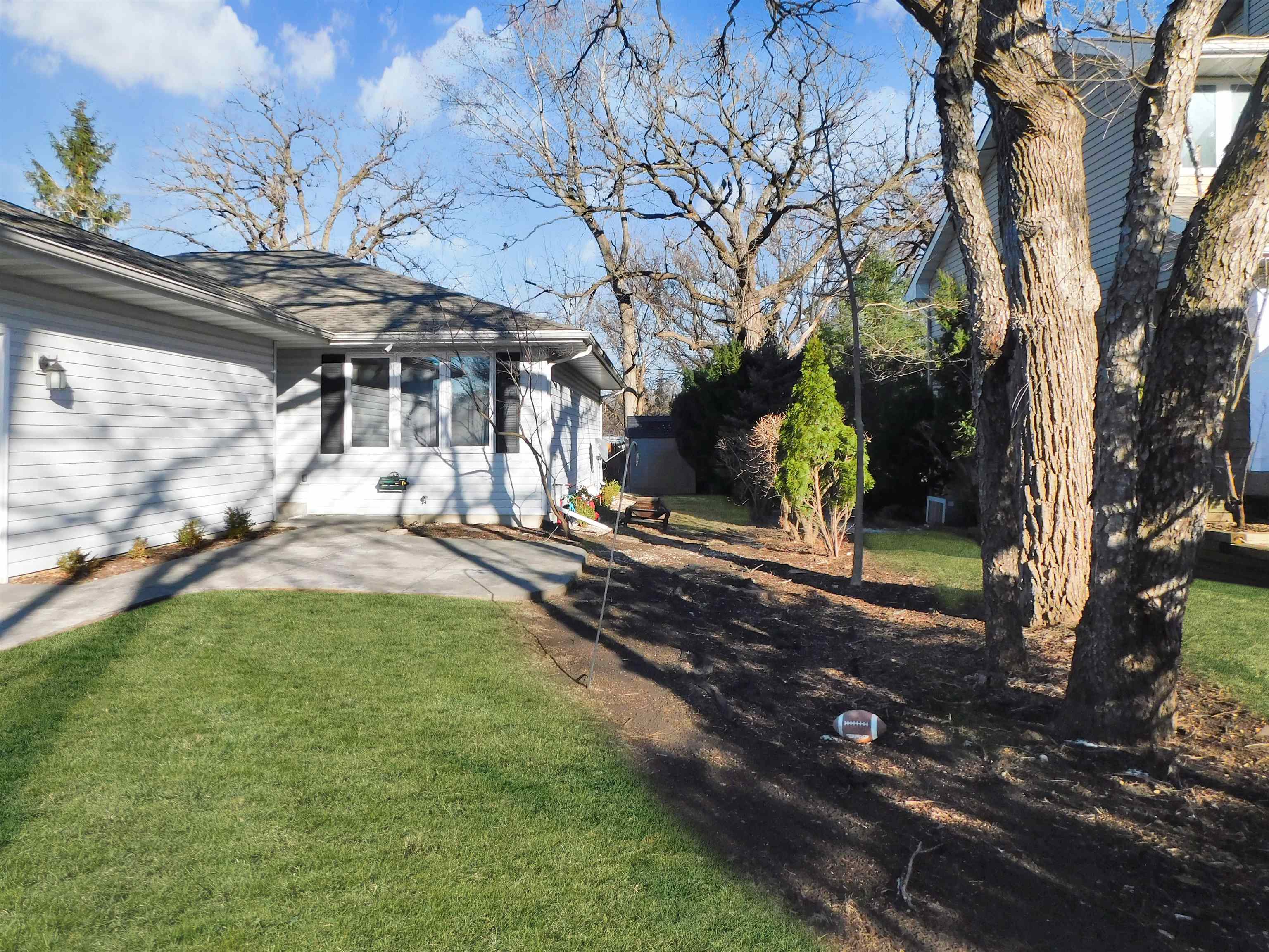 11481 Edgemere Terrace Roscoe, IL 61073 - Photo 2 of 14 a view of yard with tree