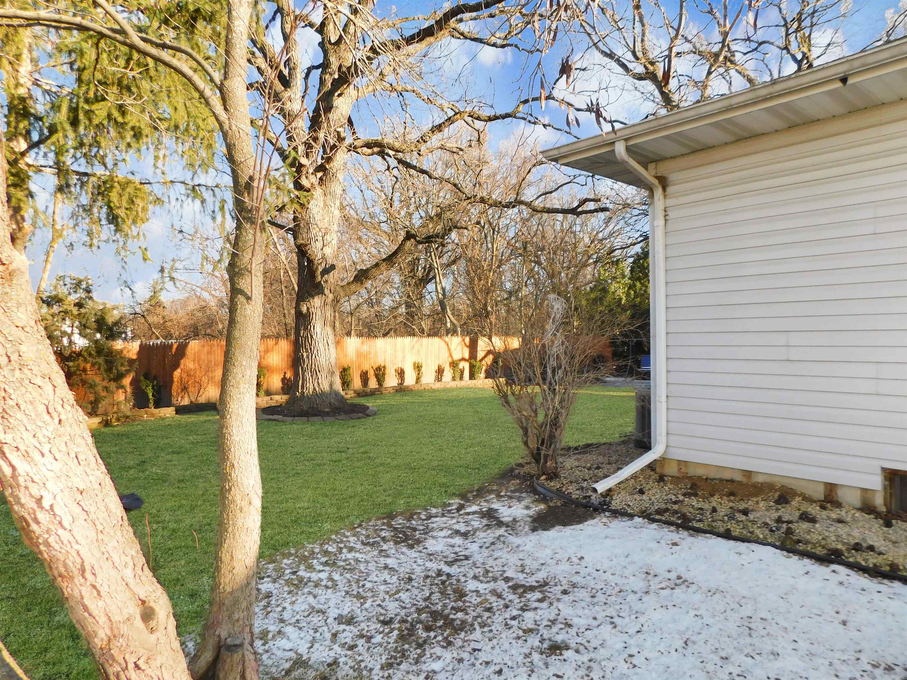 11481 Edgemere Terrace Roscoe, IL 61073 - Photo 5 of 14 a view of a backyard with large trees