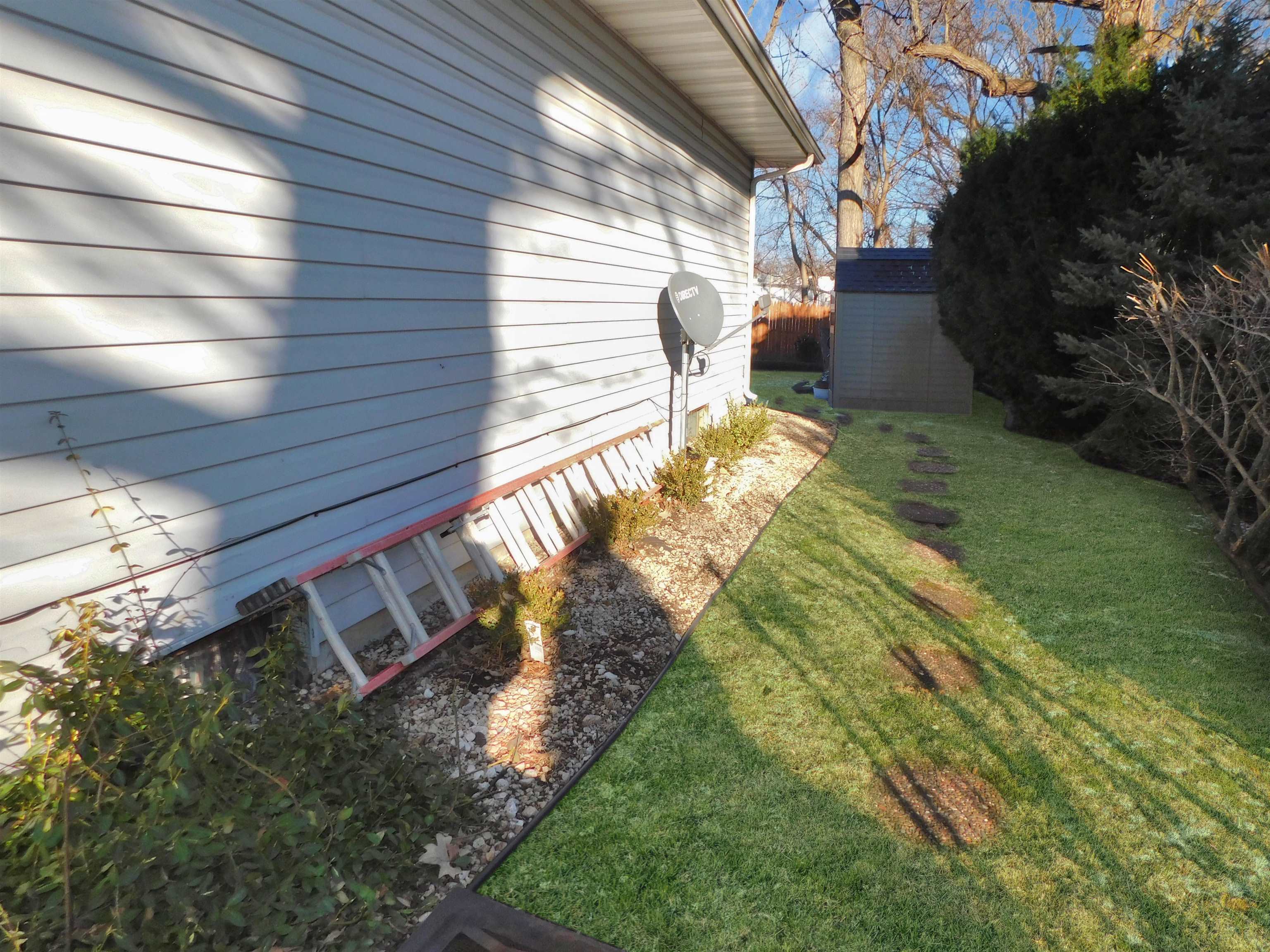 11481 Edgemere Terrace Roscoe, IL 61073 - Photo 9 of 14 a front view of a house with a yard