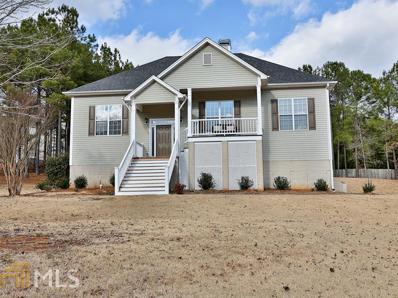 400 S Ridge, Unit D31 Senoia, GA 30276 - Photo 1 of 1 a front view of a house with a yard
