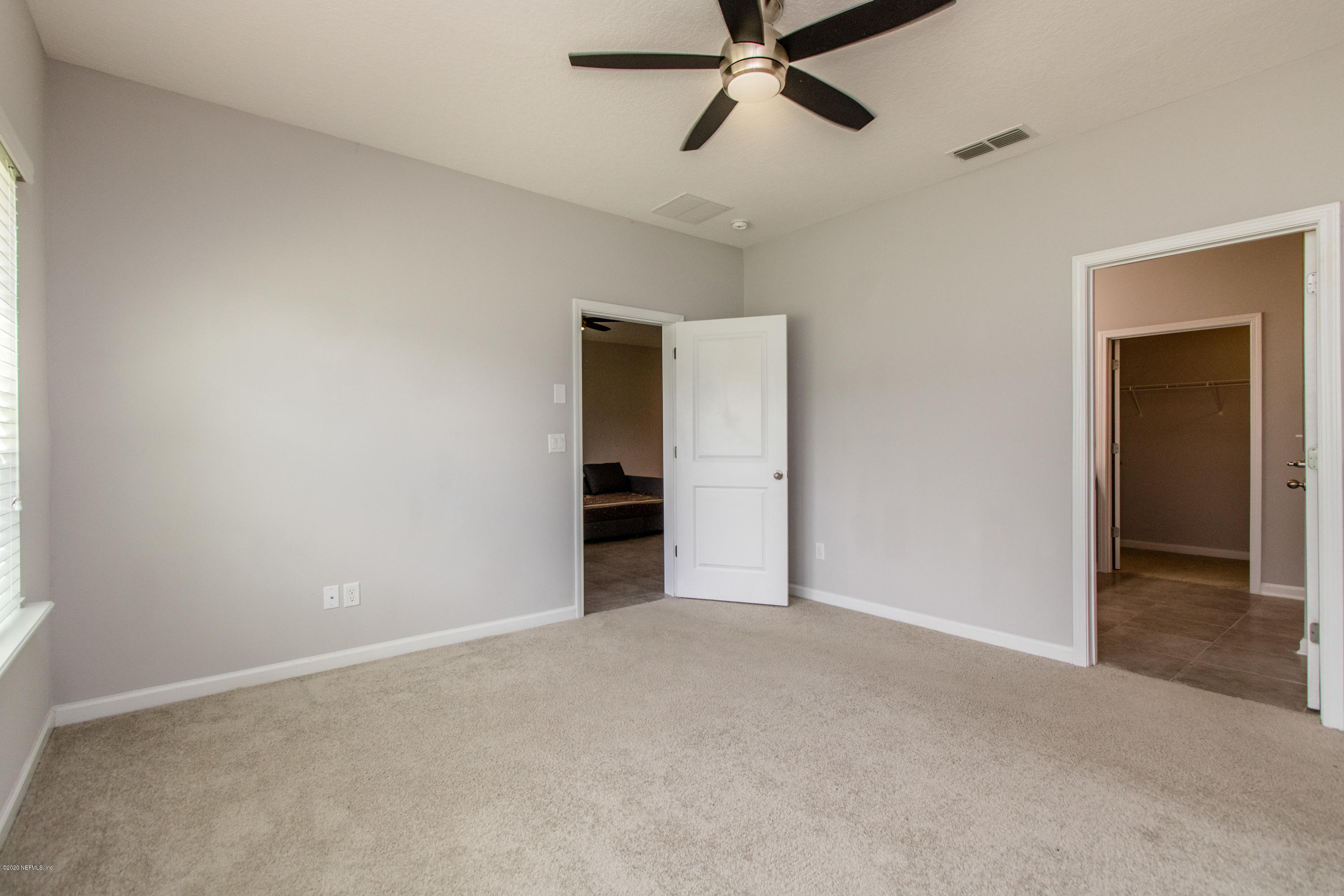3223 Chestnut Ridge Way, Unit 17D Orange Park, FL 32065 - Photo 14 of 55 Owner's Bedroom View 2