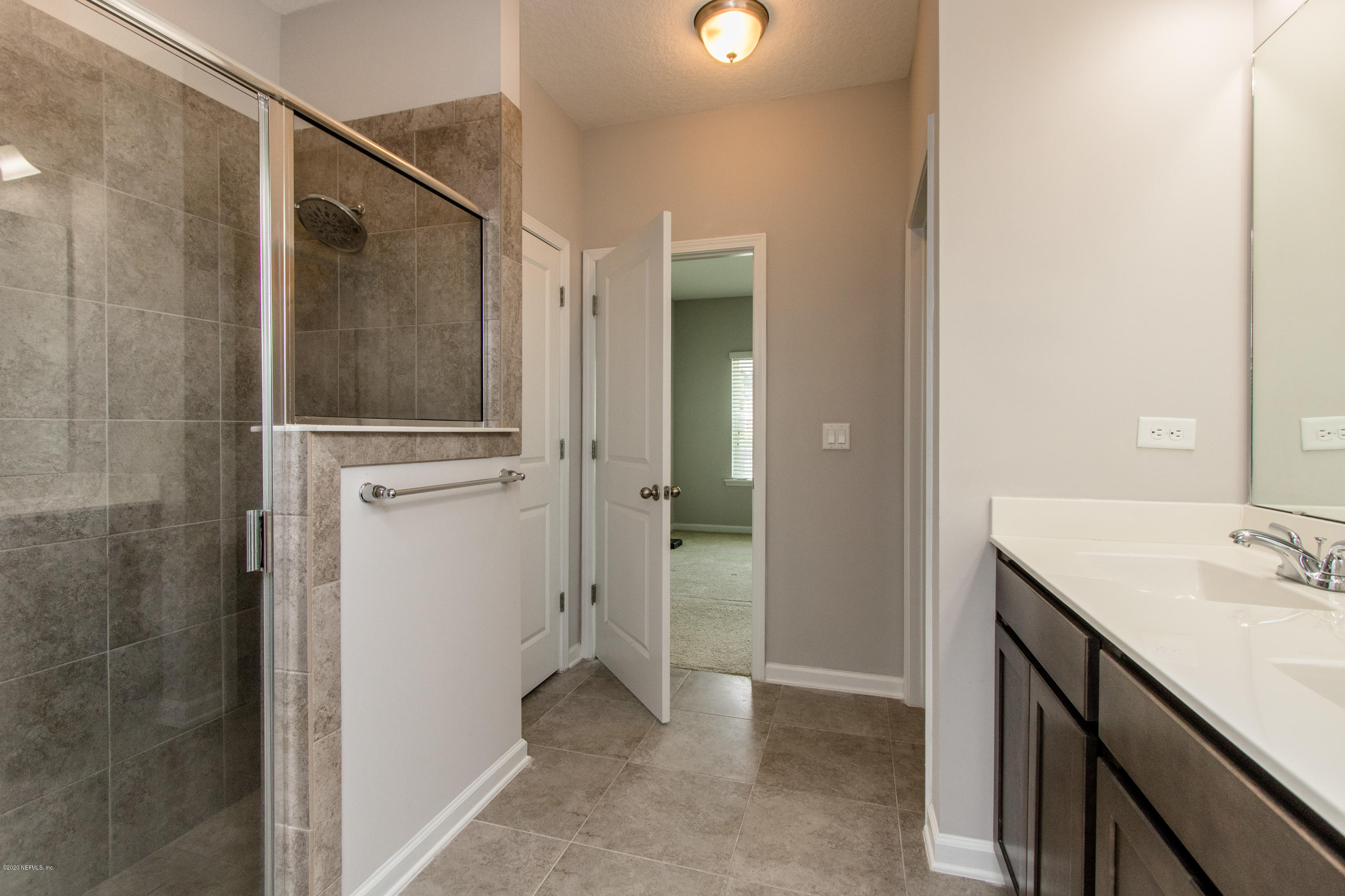 3223 Chestnut Ridge Way, Unit 17D Orange Park, FL 32065 - Photo 17 of 55 Owner's Bath View 3