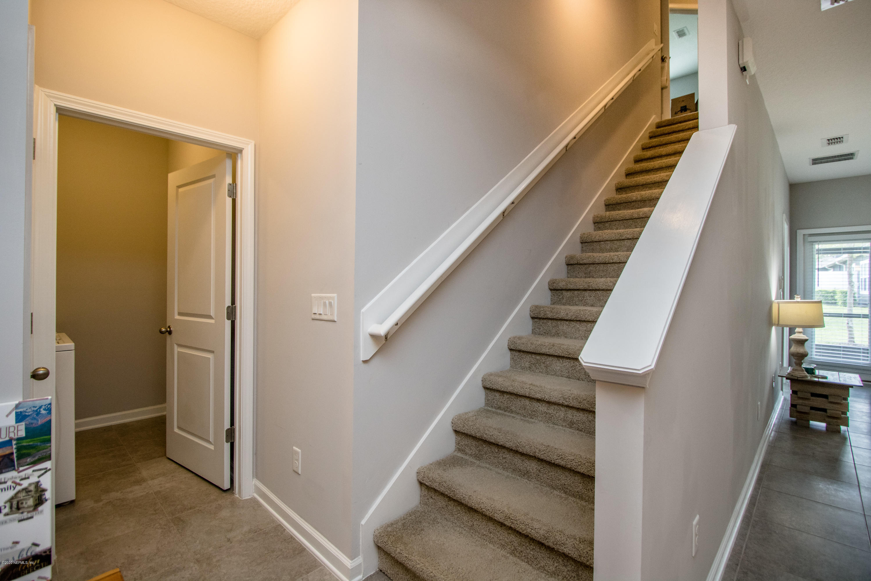 3223 Chestnut Ridge Way, Unit 17D Orange Park, FL 32065 - Photo 19 of 55 Stairs to Bedrooms 2 & 3