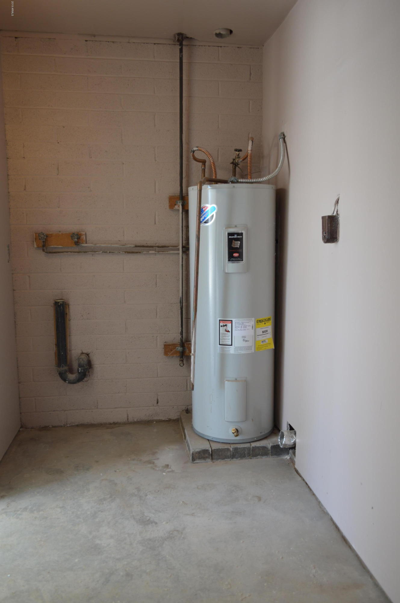 1602 West Darrel Road Phoenix, AZ 85041 - Photo 38 of 39 a view of water heater room