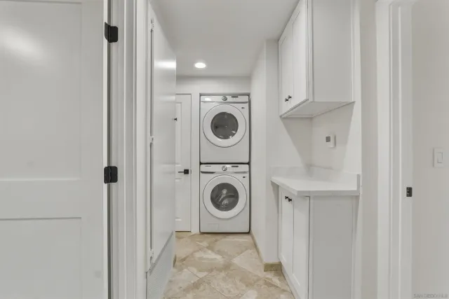 a view of washer and dryer in a utility room
