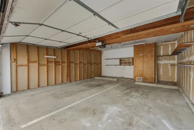 a view of a house with a iron gate