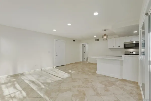 a view of a kitchen with a sink