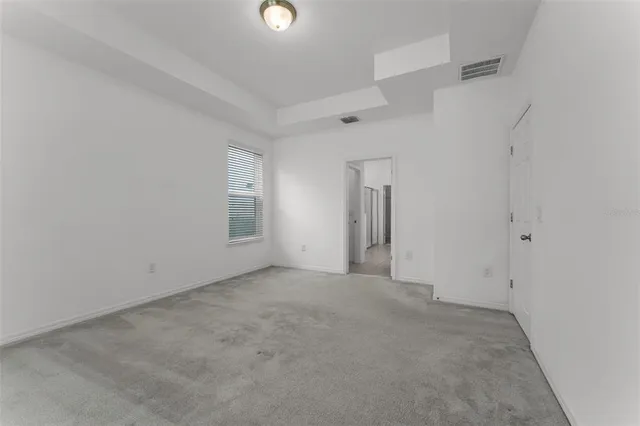 an empty room with a natural light