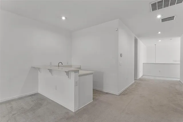 a view of a room with a sink