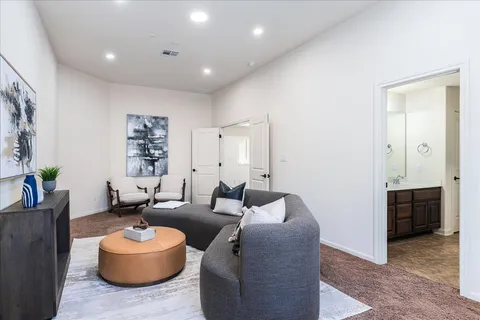 a living room with furniture and a couch