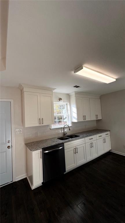 1289 Huntly Circle Thomson, GA 30824 - Photo 9 of 20 a kitchen with granite countertop stainless steel appliances a sink and cabinets