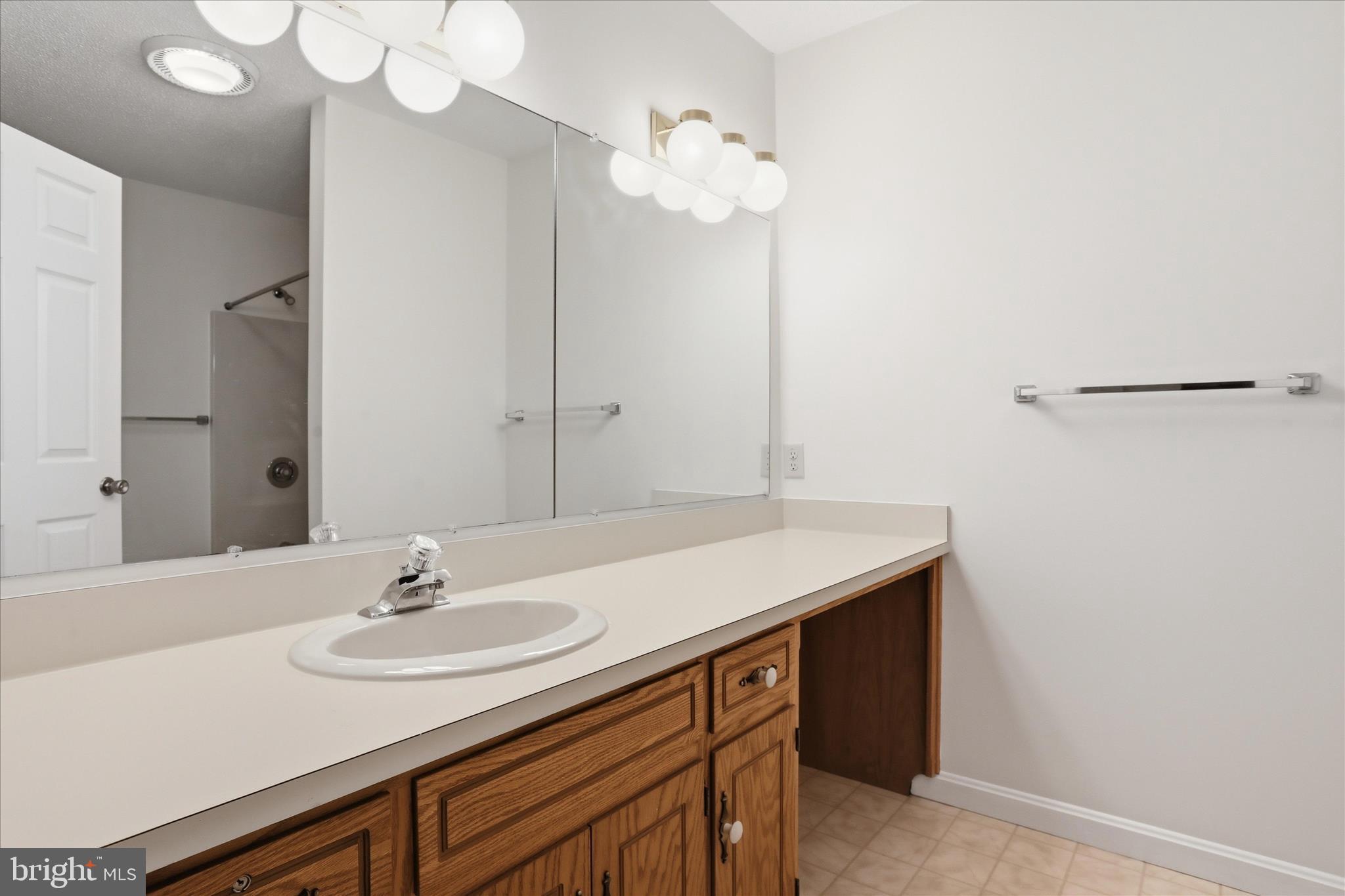 334 Stonegate Court Chambersburg, PA 17201 - Photo 15 of 25 a bathroom with a sink and a mirror