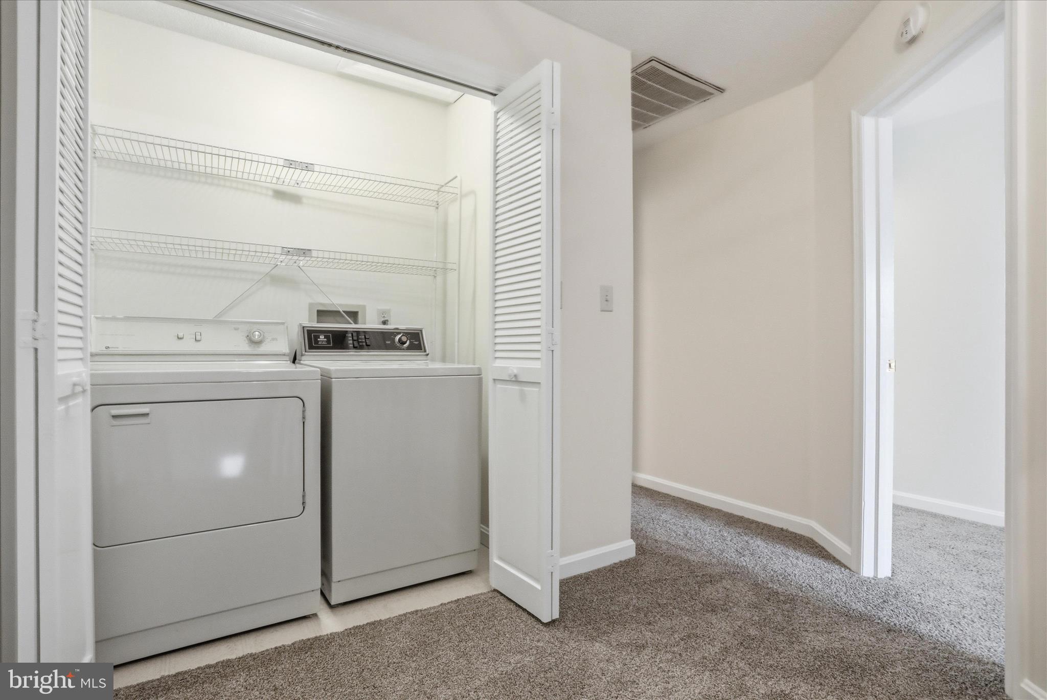 334 Stonegate Court Chambersburg, PA 17201 - Photo 17 of 25 a utility room with dryer and washer