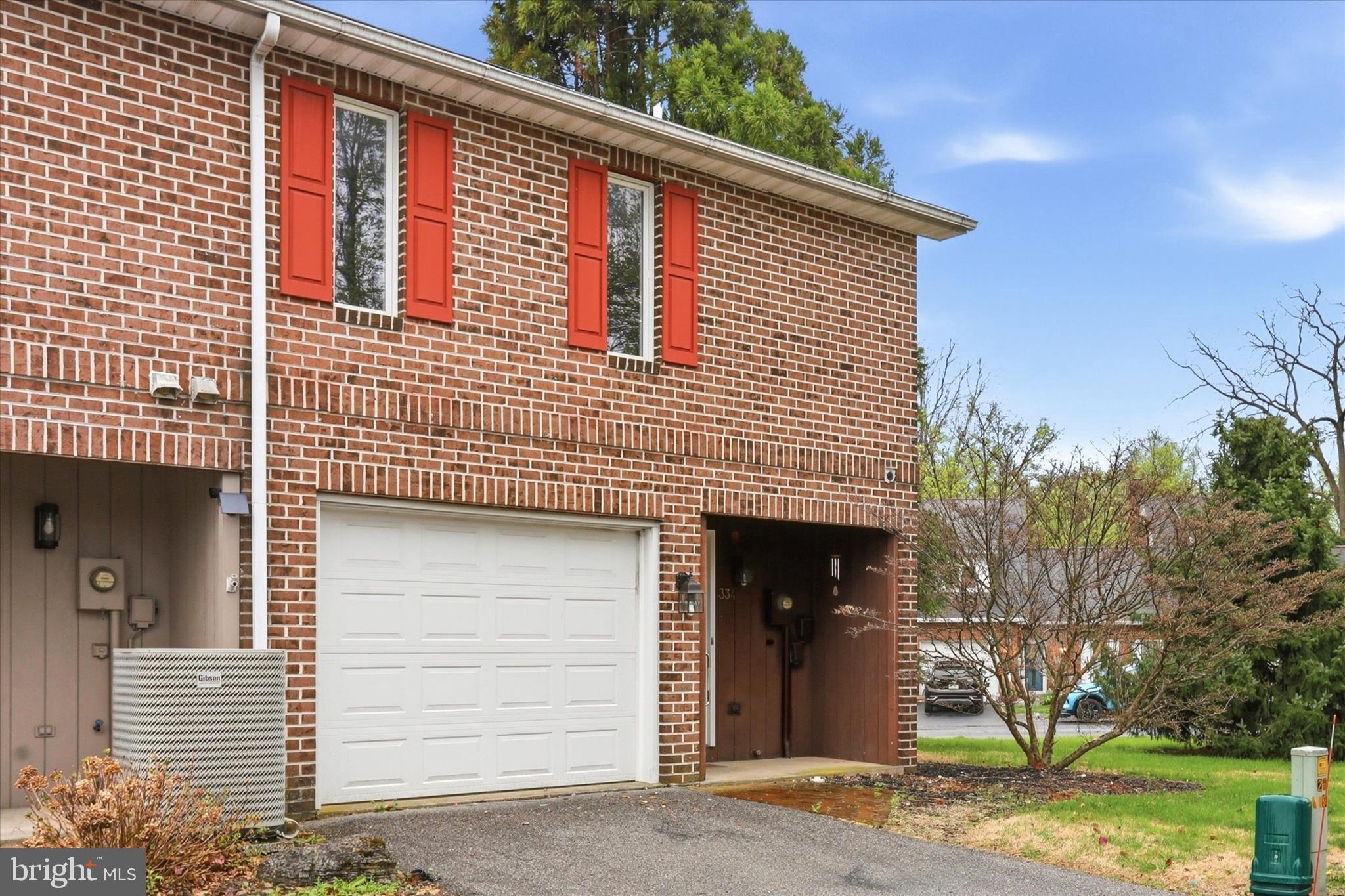 334 Stonegate Court Chambersburg, PA 17201 - Photo 2 of 25 a front view of a house with a yard