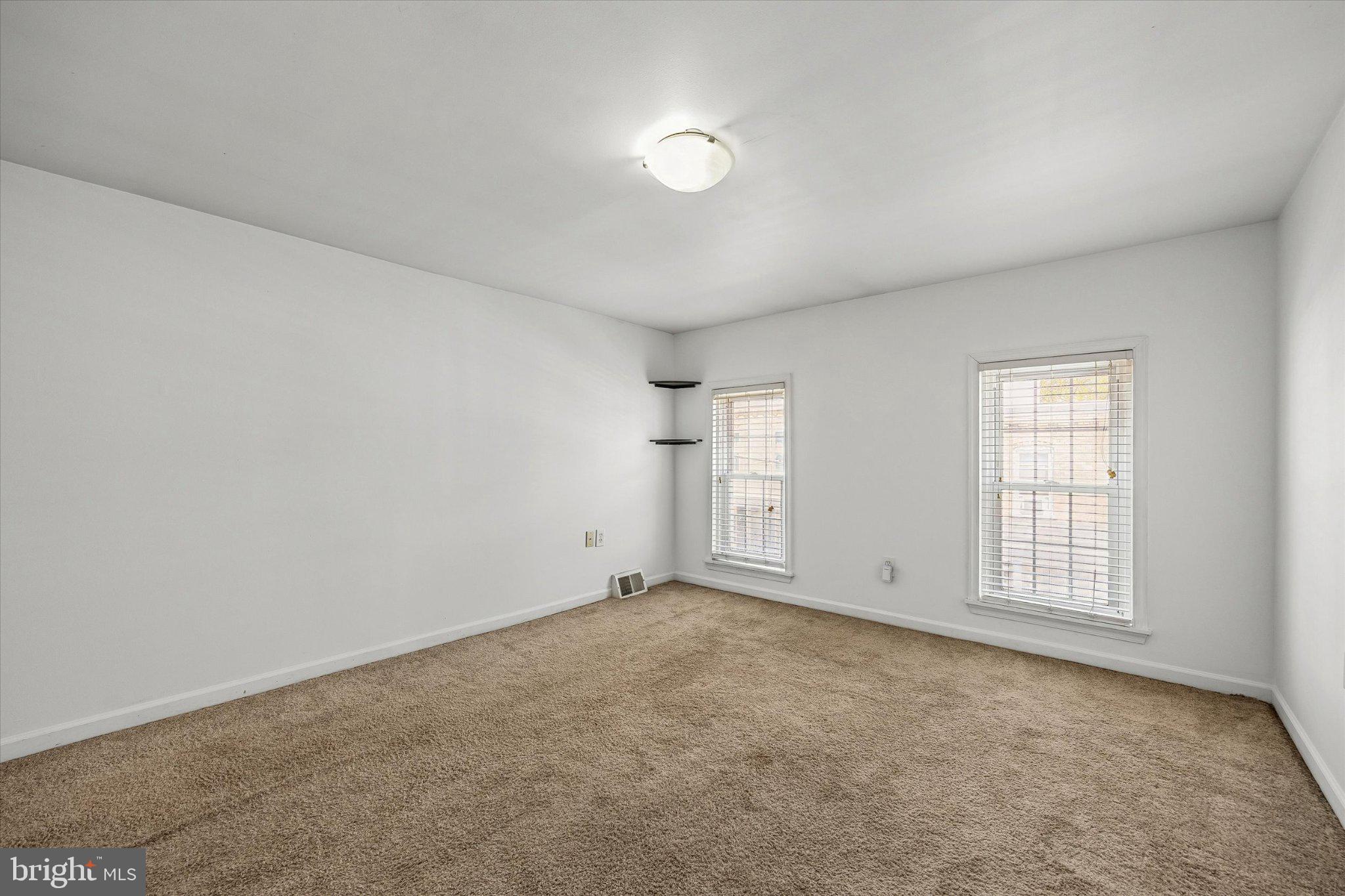 4334 Fleming Street Philadelphia, PA 19128 - Photo 13 of 25 an empty room with windows