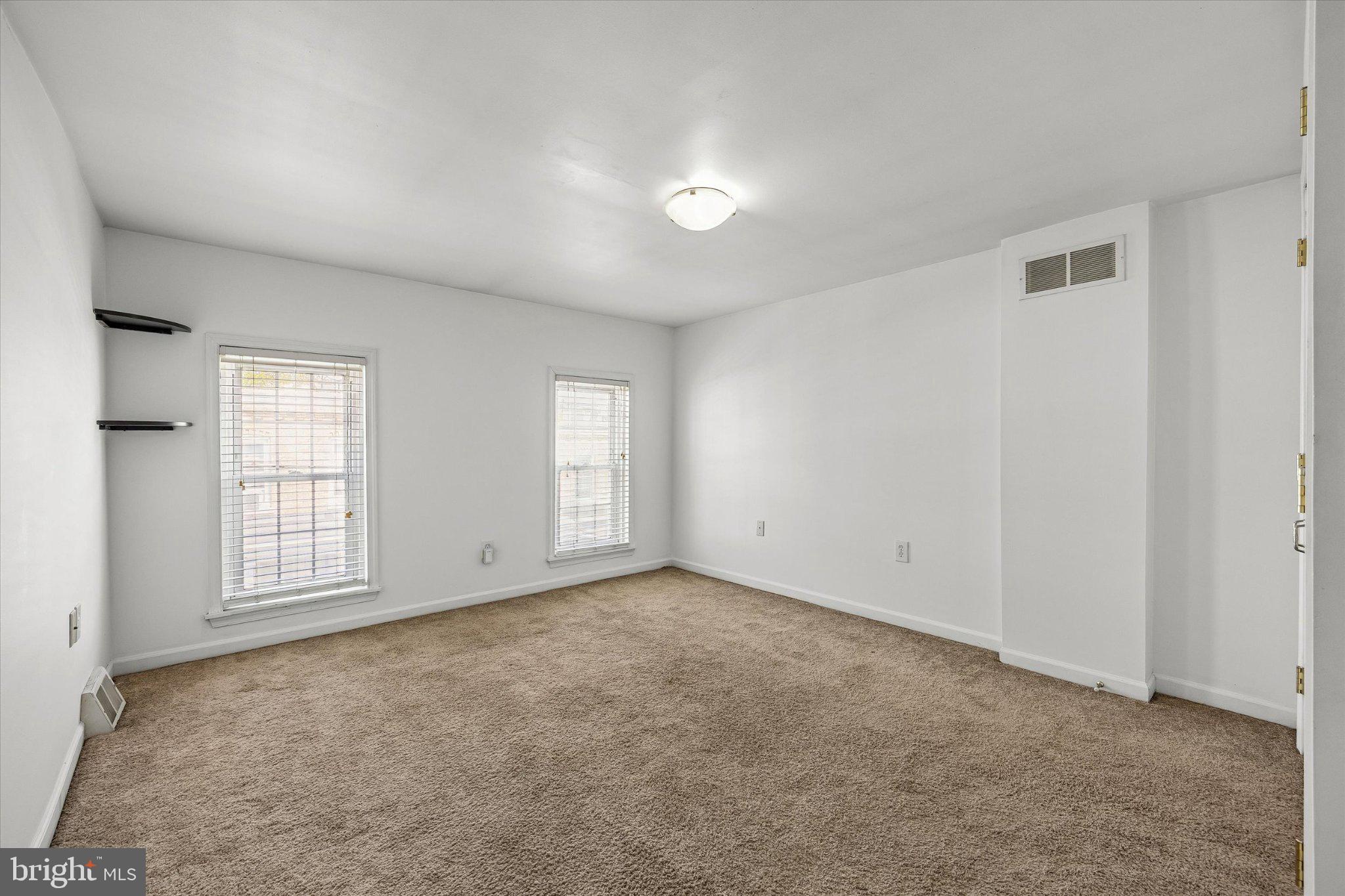 4334 Fleming Street Philadelphia, PA 19128 - Photo 14 of 25 an empty room with windows