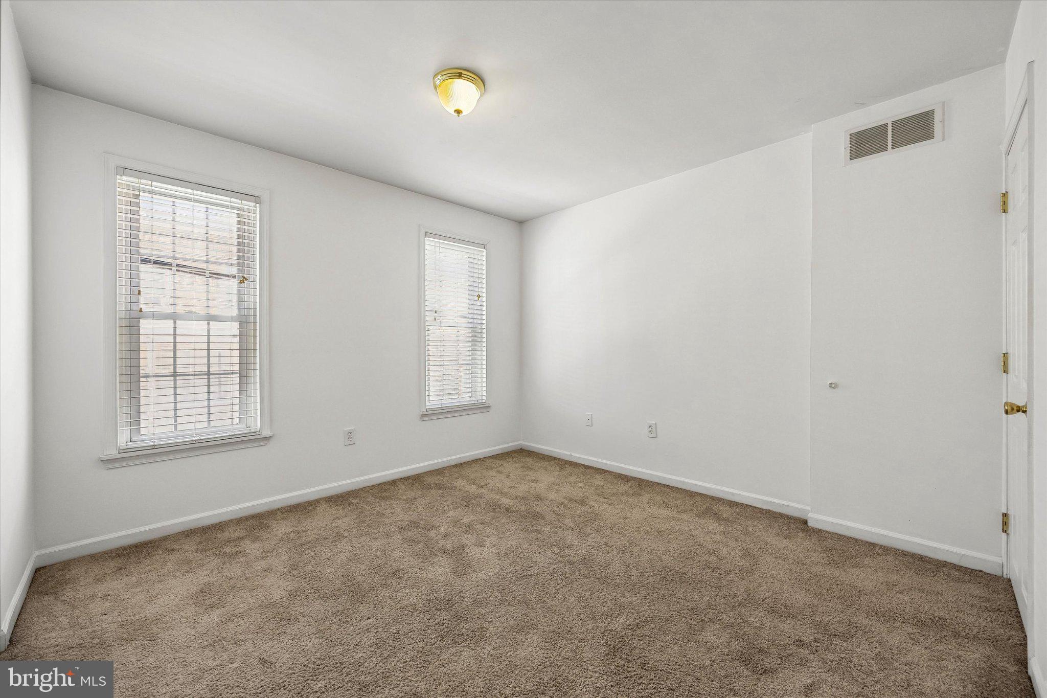 4334 Fleming Street Philadelphia, PA 19128 - Photo 19 of 25 an empty room with windows