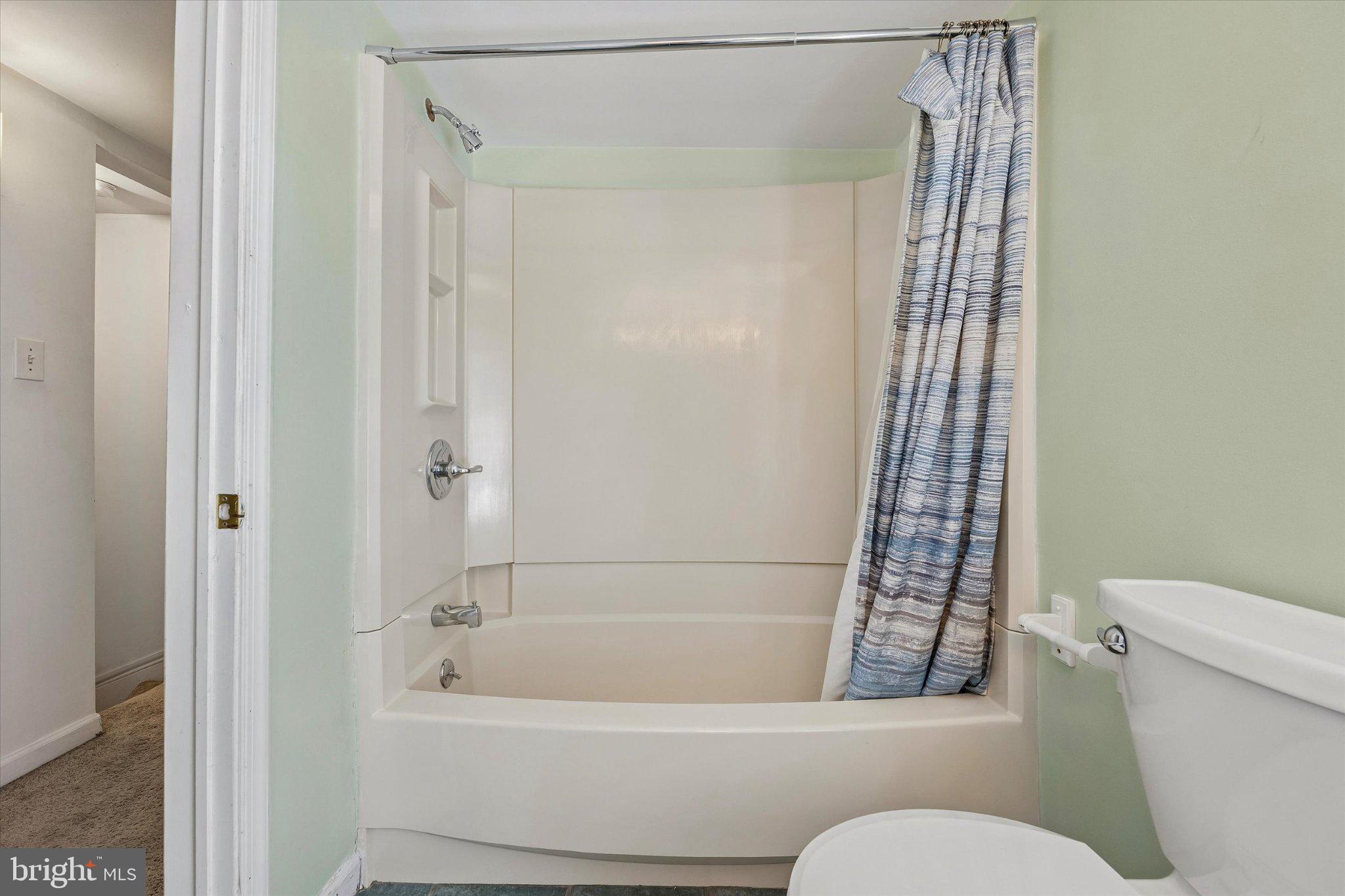 4334 Fleming Street Philadelphia, PA 19128 - Photo 22 of 25 a bathroom with a toilet and a shower