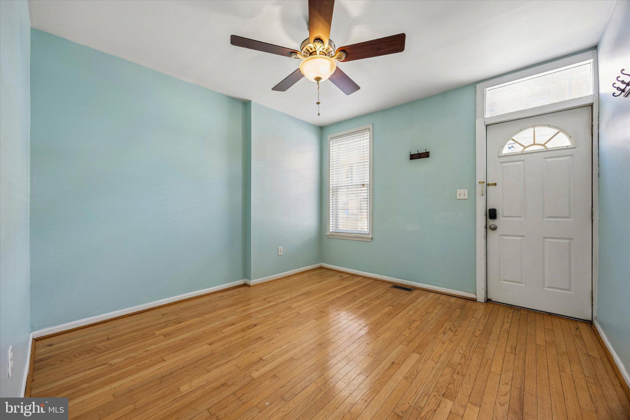 4334 Fleming Street Philadelphia, PA 19128 - Photo 4 of 25 wooden floor in an empty room with a window
