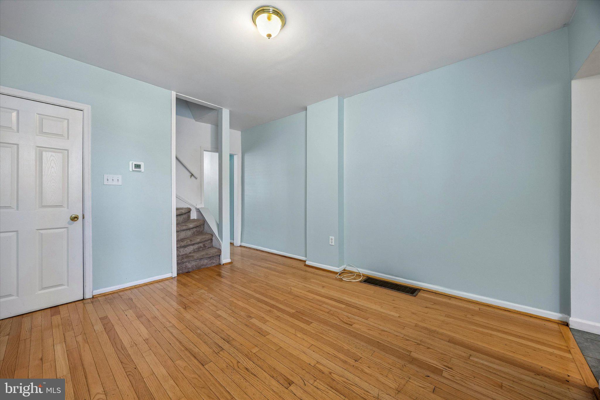 4334 Fleming Street Philadelphia, PA 19128 - Photo 5 of 25 a view of an empty room with wooden floor