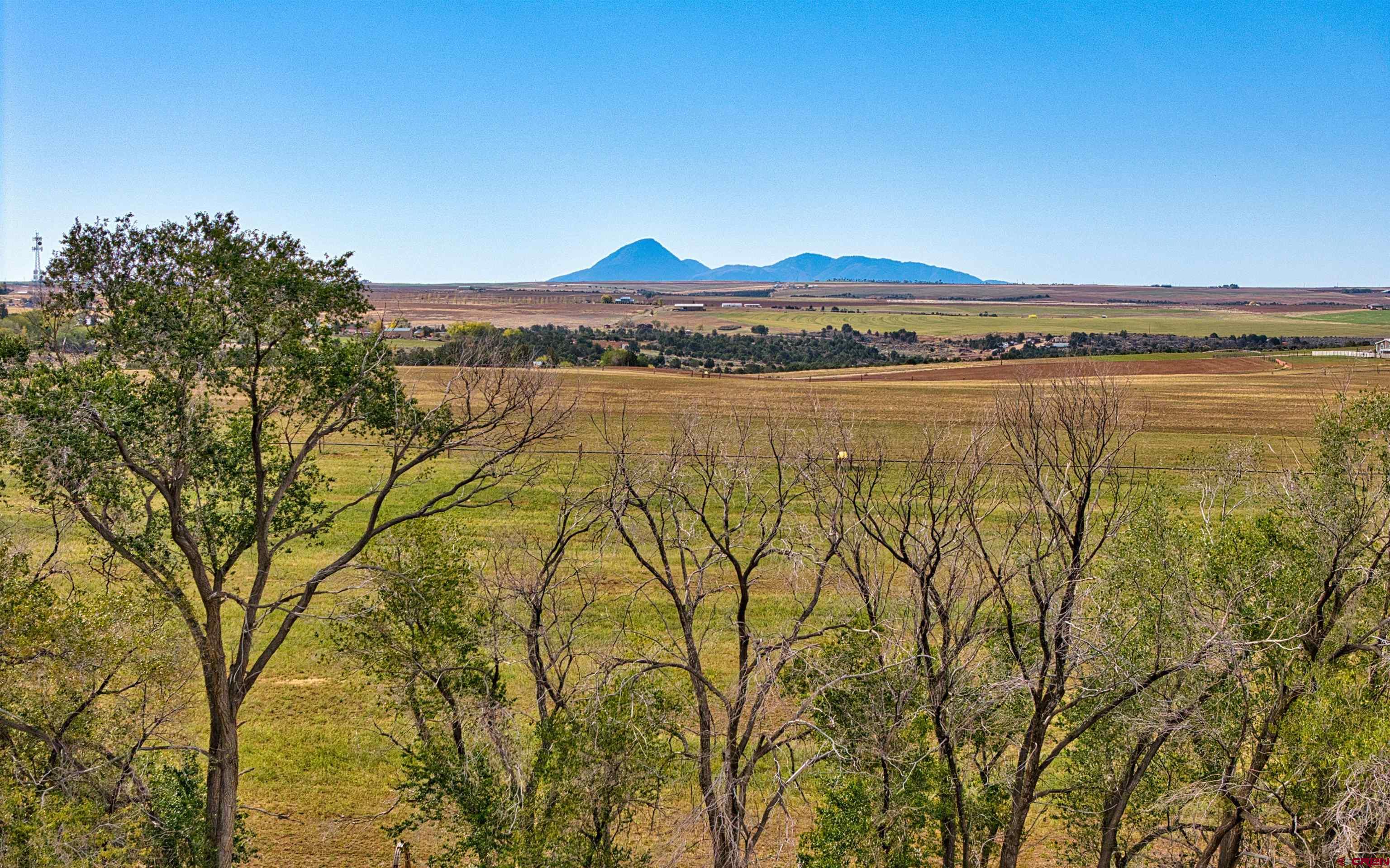 Tbd Rd R Cahone, CO 81320 - Photo 11 of 19 a view of lake with a mountain in the background