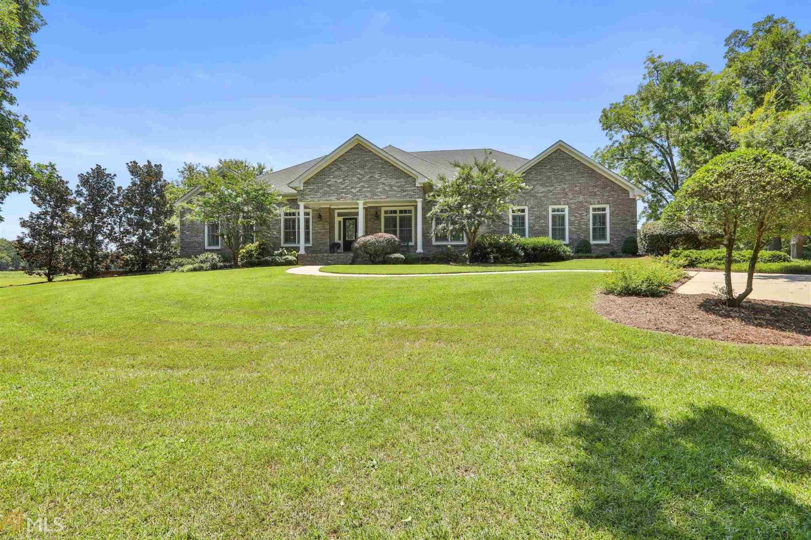 554 McCrary Road Molena, GA 30258 - Photo 1 of 1 a front view of a house with a yard