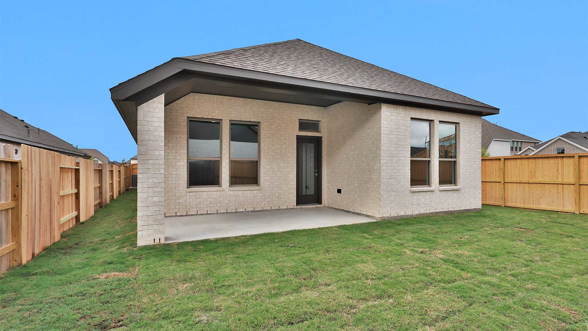 303 Eileen Drive Rosenberg, TX 77471 - Photo 16 of 20 a front view of a house with a yard