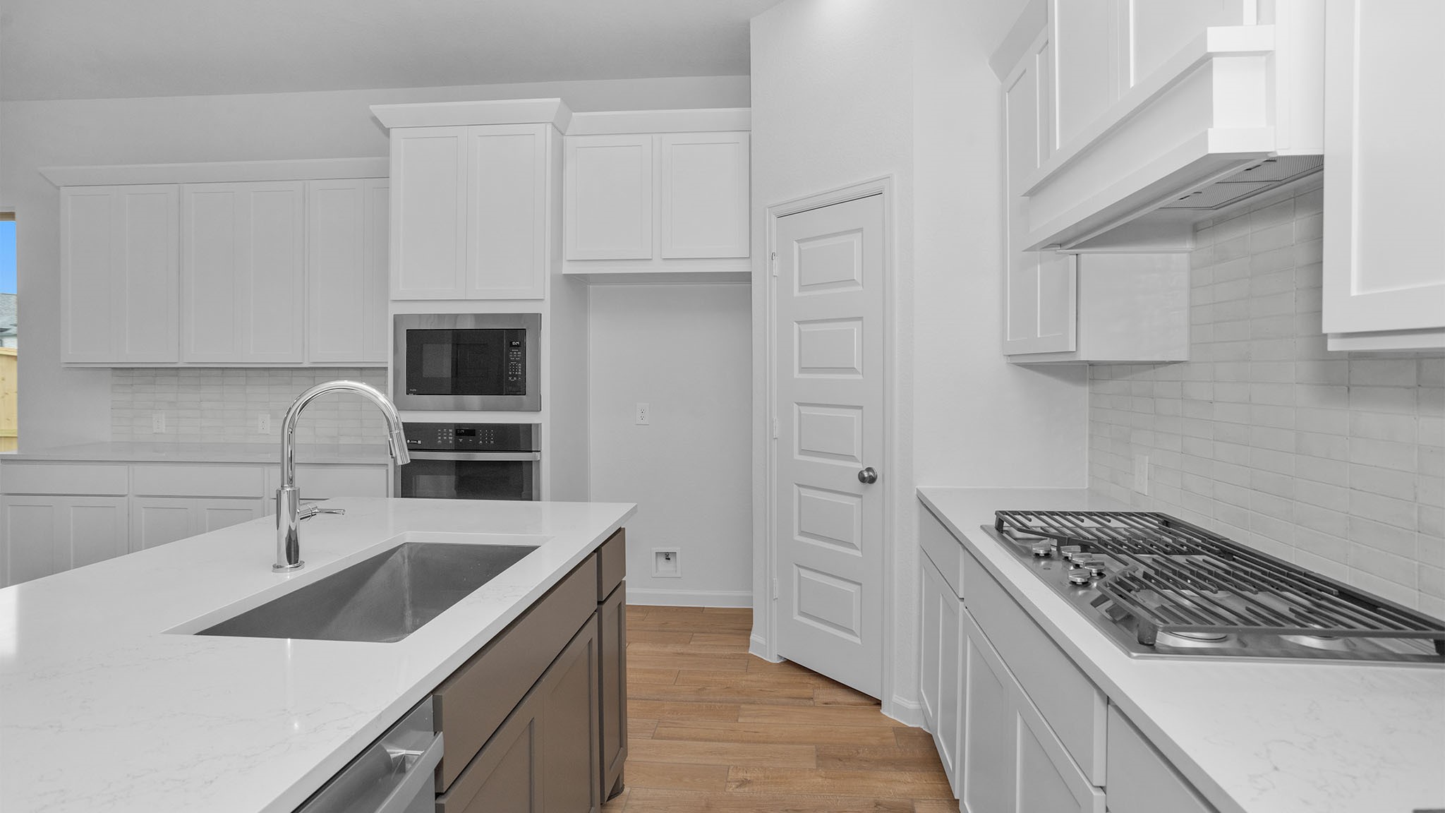 303 Eileen Drive Rosenberg, TX 77471 - Photo 8 of 20 a kitchen with stainless steel appliances granite countertop a sink stove and cabinets