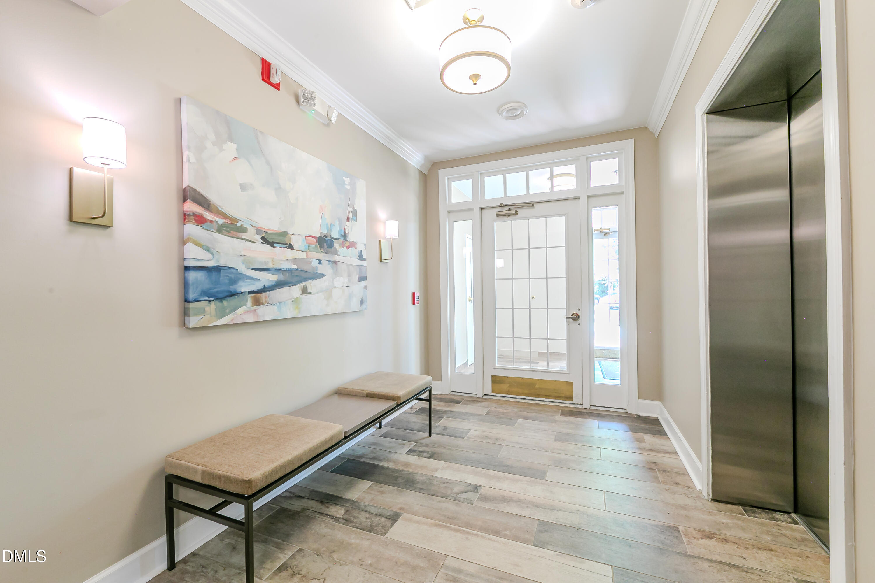 116 Northbrook Drive, Unit 305 Raleigh, NC 27609 - Photo 16 of 43 a view of a room with wooden floor and windows