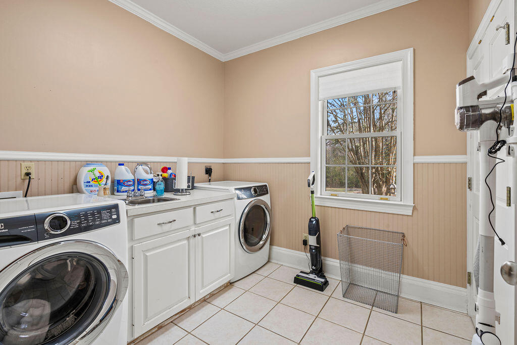 728 Otter Pond Road Westville, FL 32464 - Photo 15 of 39 a utility room with dryer and washer