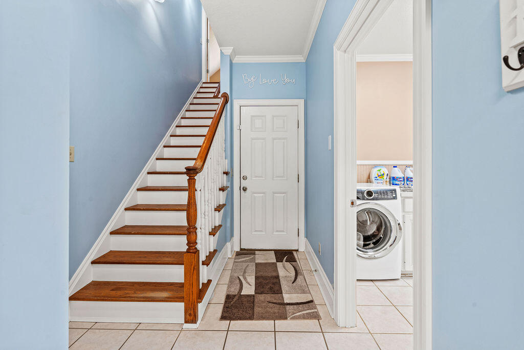728 Otter Pond Road Westville, FL 32464 - Photo 16 of 39 a view of entryway and hall with wooden floor