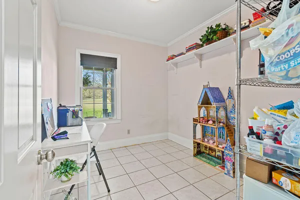 a view of a entryway with furniture and toys